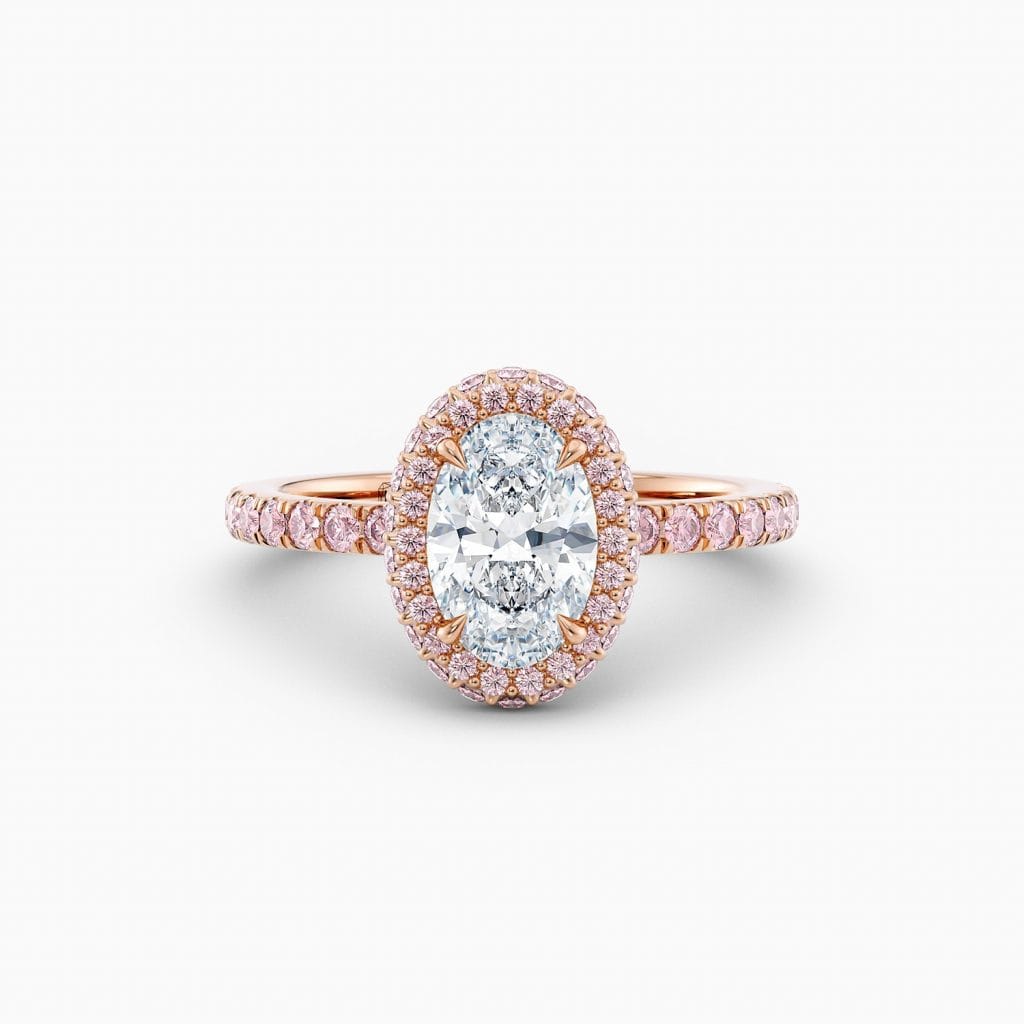 Engagement Rings & Coloured Stones in 2026 That You’ll Love 80 Pink Halo – Oval Cut, Diamond Band