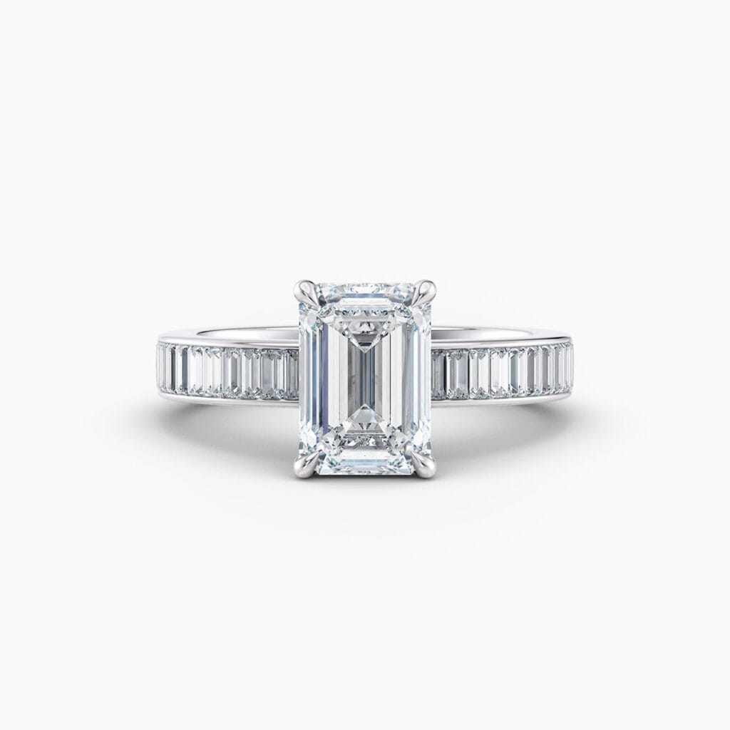 Engagement Rings & Coloured Stones in 2026 That You’ll Love 85 2ct Emerald cut diamond ring with baguette channel set diamonds in white gold