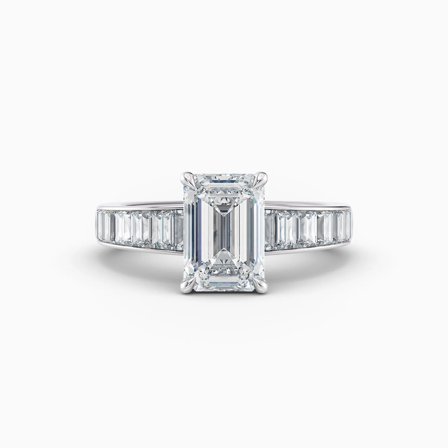 2ct emerald cut diamond ring with channel set baguetted diamonds in white gold