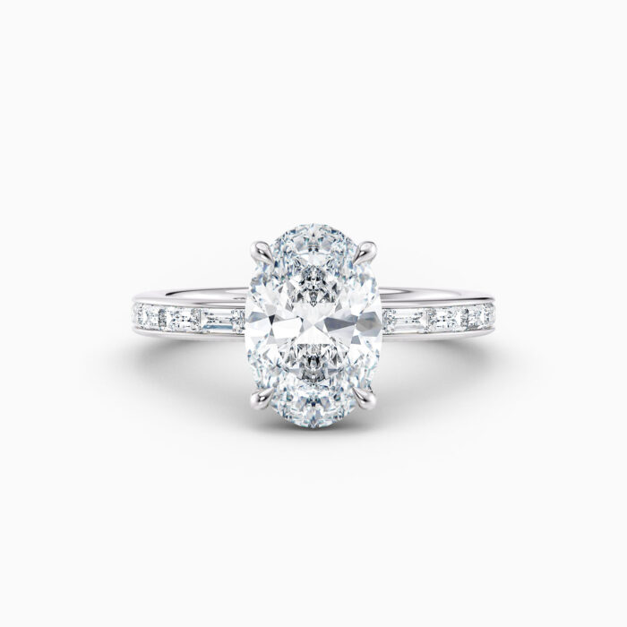 2ct oval diamond with baguette diamonds in white gold