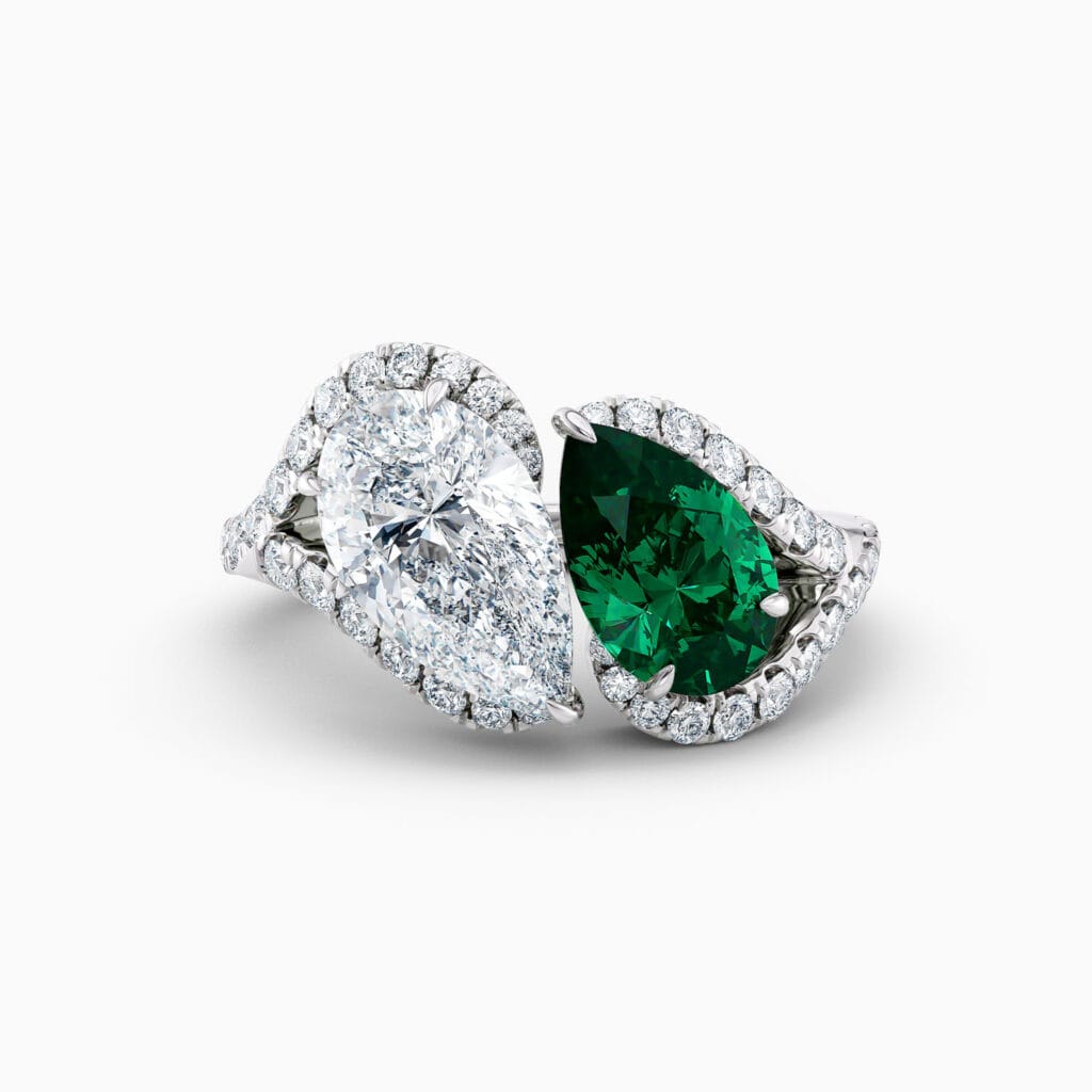 Engagement Rings & Coloured Stones in 2026 That You’ll Love 160 pear shape diamond and emerald toi et moi in platinum