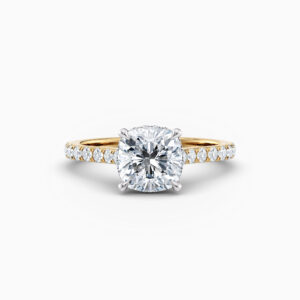 cushion cut solitaire engagement ring in yellow gold