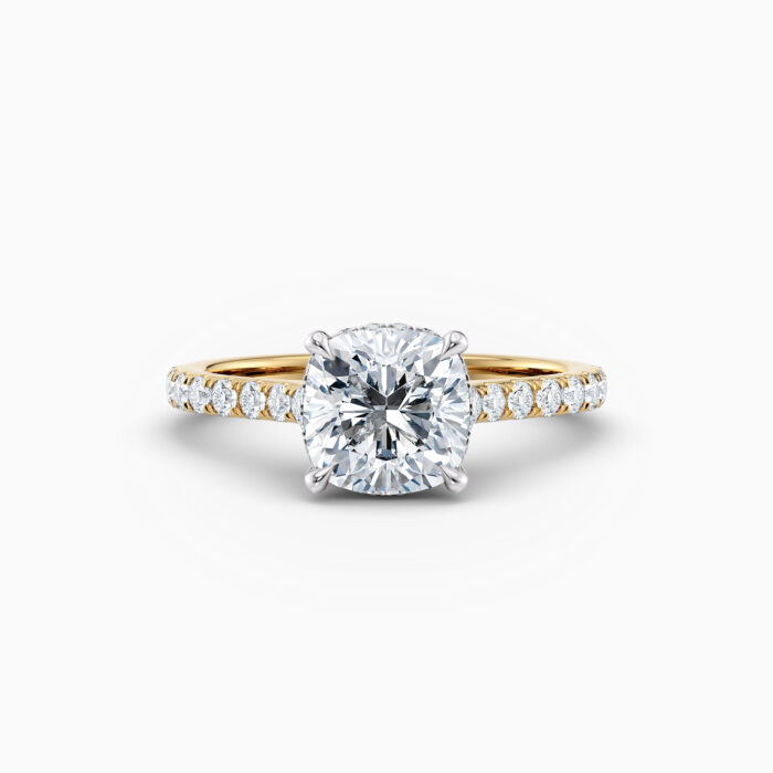 cushion cut solitaire engagement ring in yellow gold