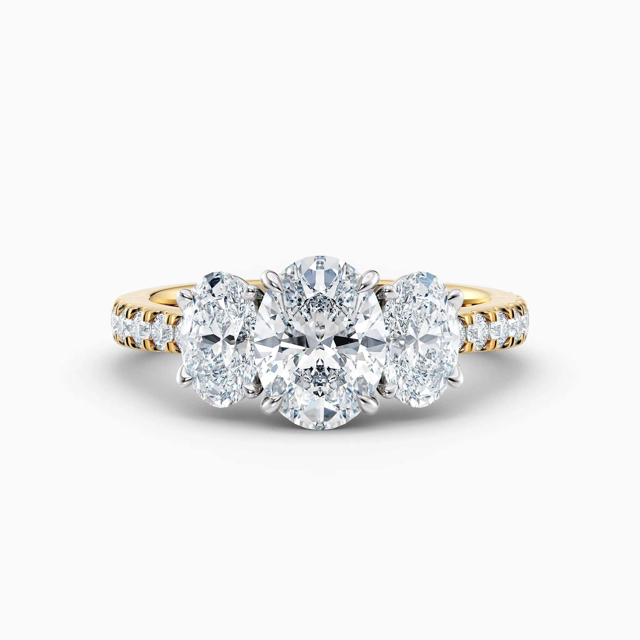 Oval 3 stone yellow gold engagement ring