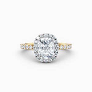 cushion cut halo engagement ring in yellow gold