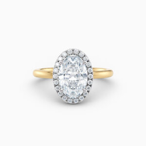 oval halo diamond engagement ring in yellow gold