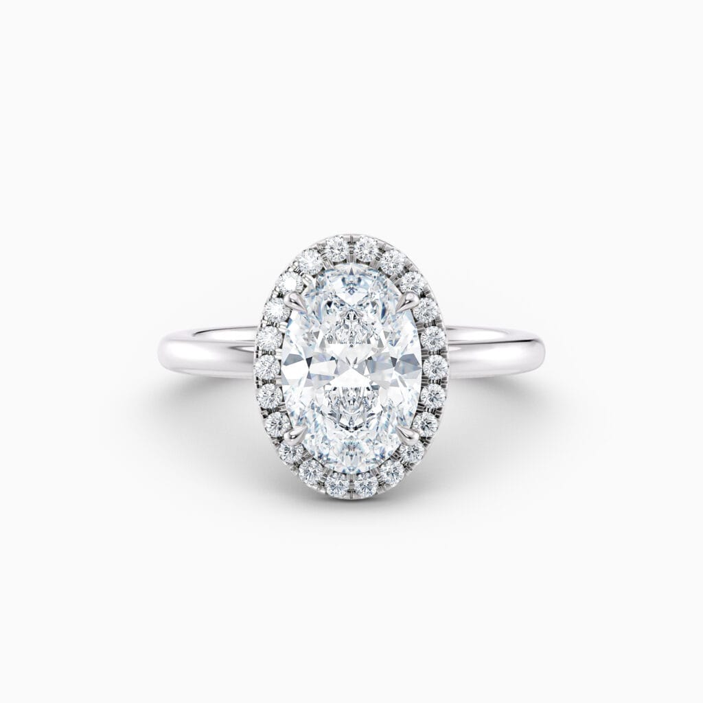 Engagement Rings & Coloured Stones in 2026 That You’ll Love 31 white gold oval halo engagement ring