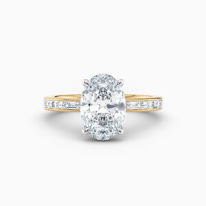 2ct oval diamond solitaire with bagette diamonds in yellow gold