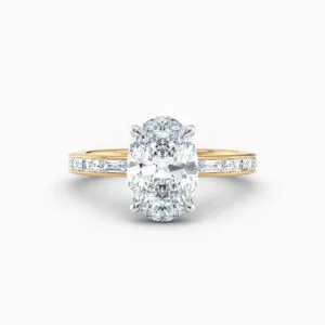 2ct oval diamond solitaire with bagette diamonds in yellow gold