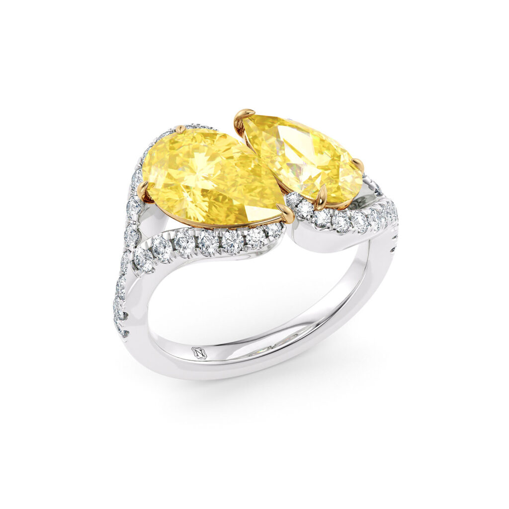 pear shape yellow diamond in toi et moi design in platinum