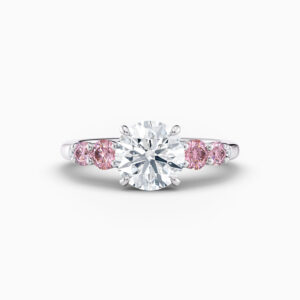 2ct centre diamond ring with round pink diamonds either side in platinum