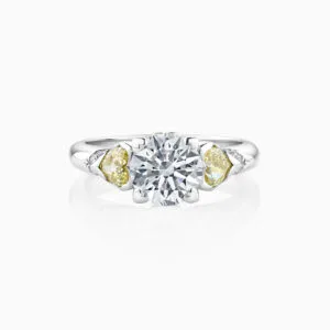 3 stone engagement ring with white , yellow and pink diamonds in platinum